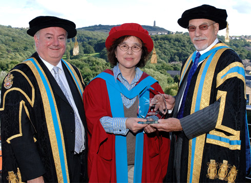 Pictured with Professor Jiang are the University's Vice-Chancellor, Professor Bob Cryan (left), and Chancellor, Sir Patrick Stewart (right).