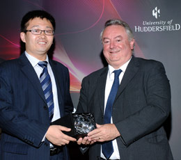 Chinese engineer Dong Zhen receives Research Student of the Year award from Prof Bob Cryan