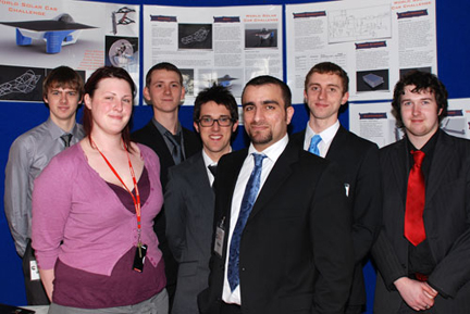 Pictured with Jennifer Hirst of Cummins are the Huddersfield student engineers 
(l-r) Josh Harbour, Bryan Doan, Dan Briggs, team leader Khader Hankir, Tom Daniels and Chris Moran.