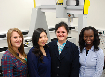 Female engineering students with Dr Crinela Pislaru